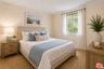 PRIMARY BEDROOM WITH HARDWOOD
