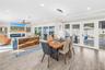 Dining room opens into lanai through French Doors.