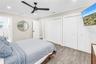 Double closets in Primary Suite with custom built in organizers.