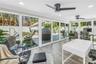 Beautiful light filled living space surrounded by impact rated double sliders.