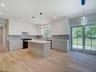 Kitchen overlooks Backyard
