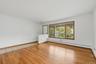 Entry with view towards Living Room, Dining Area, Kitchen.  Unit 1