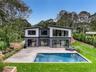 Modern architectural design featuring varied siding