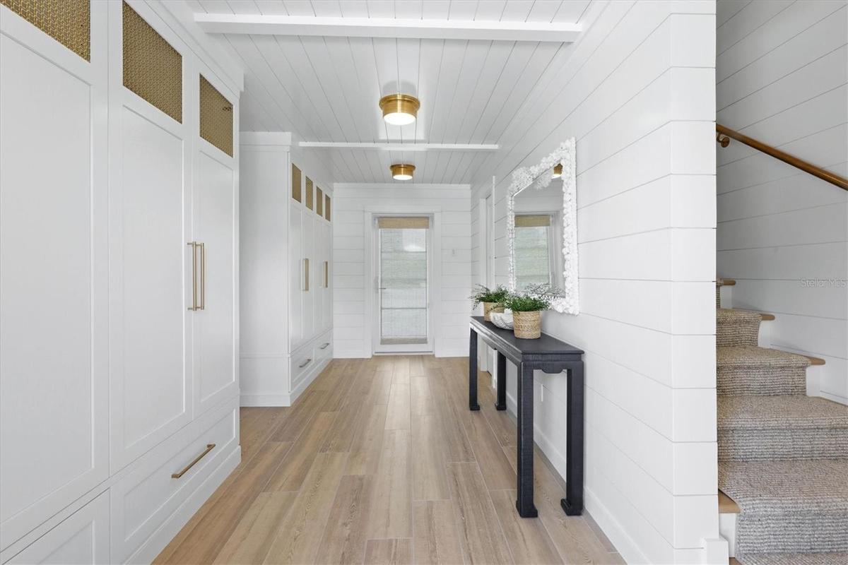 Beautifully designedd front entry with custom designed cabinetry
