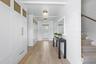 Beautifully designedd front entry with custom designed cabinetry