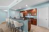 Fully stocked kitchen with generous storage and a walk-in pantry.