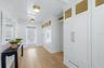 Beautifully designed front entry with custom designed cabinetry