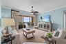 Bright, inviting living space with tile flooring and offered fully furnished.