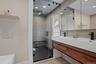 En Suite Spa Bathroom With Double Floating Vanity & Luxurious Steam Shower