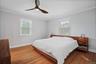 King Size Primary Bedroom With Ceiling Fan