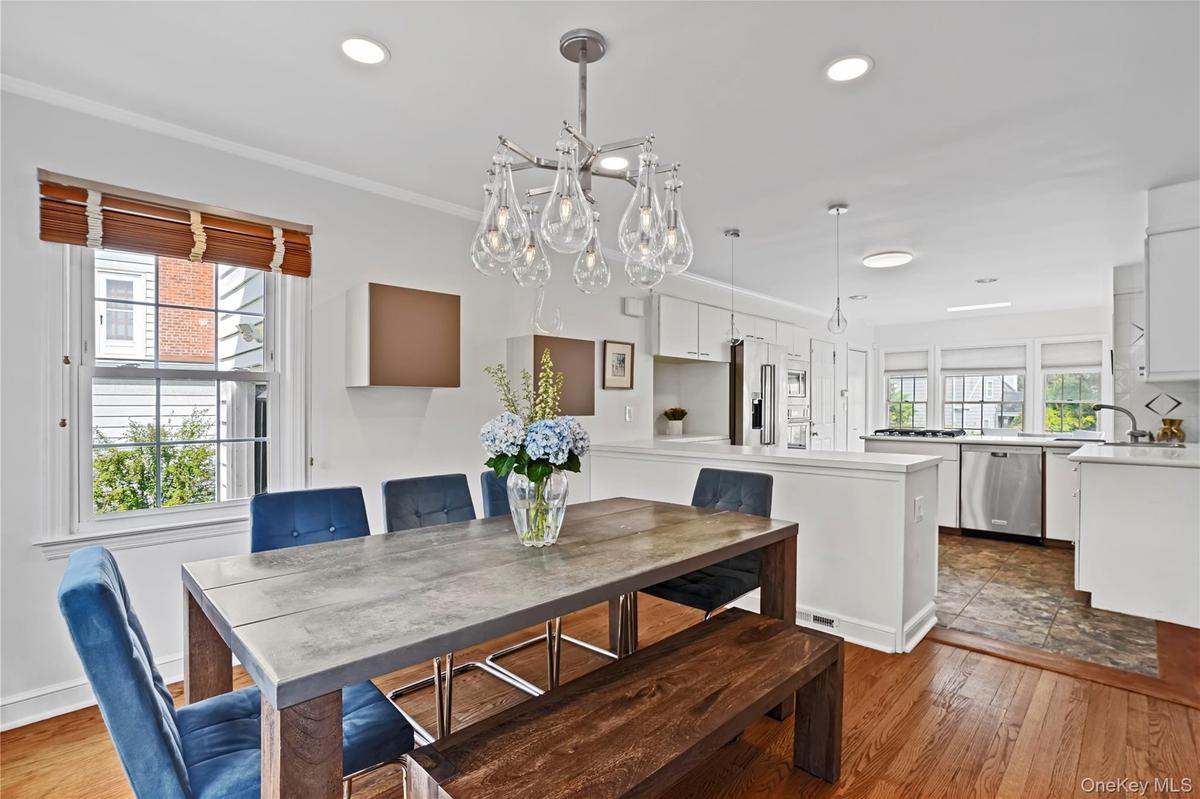 Dining Room Opens Naturally To The Kitchen
