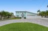544 Lillian Dr, Madeira Beach - Concrete black with vinyl siding