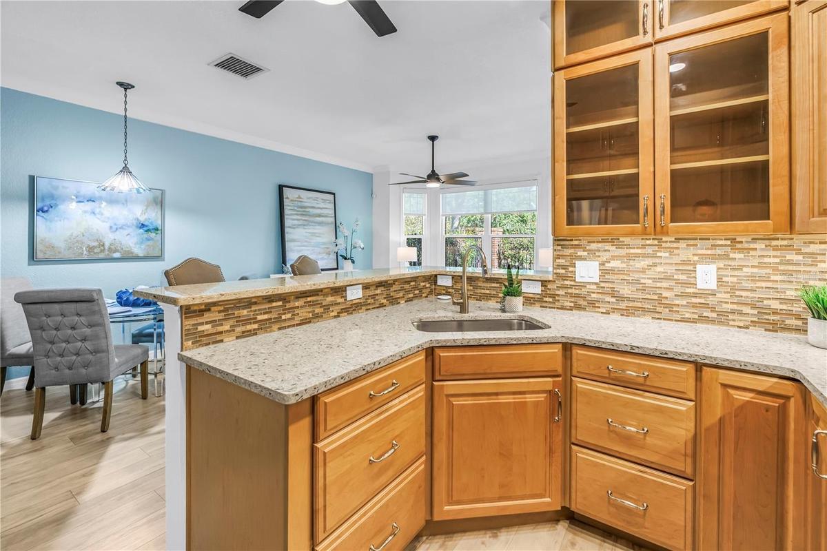 Kitchen flows easily into the dining and living areas.