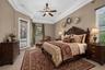 Virtually staged primary bedroom option 2