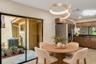 Casual dining area beside the kitchen with sliding-door access outdoors.