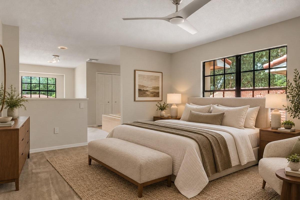 Spacious primary bedroom with room for additional seating