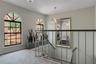 Updated carpet and stairway railing