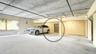 The parking space under the building and the storage unit.