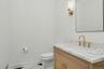Renovated Powder room off family room.