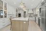 Gorgeous Gourmet Kitchen with Stainless steel appliances.