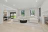 Family room with fireplace, Custom shades.