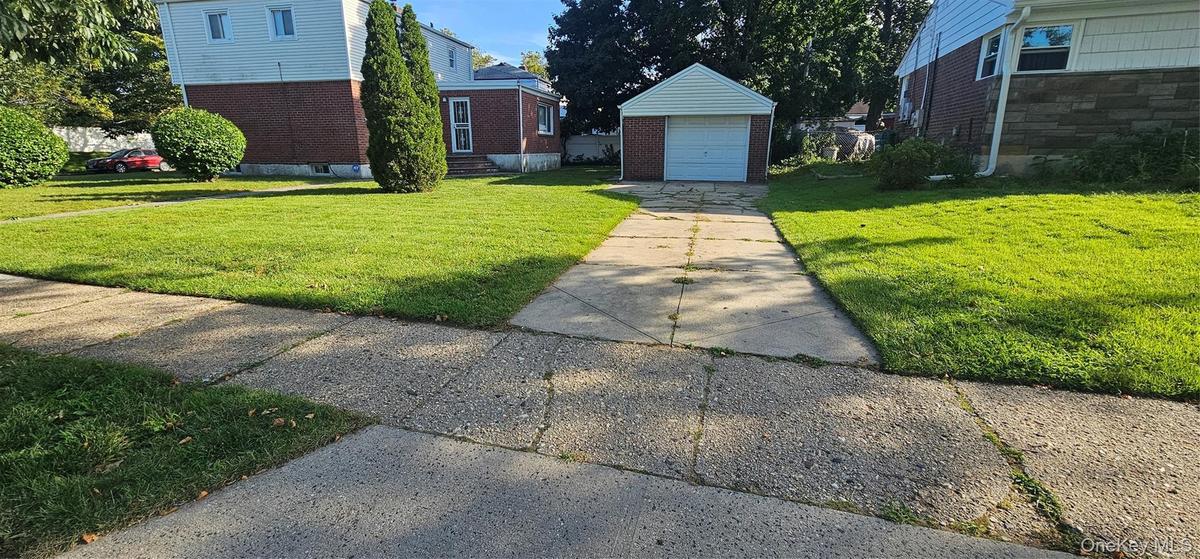 GARAGE AND DRIVEWAY 1