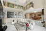 Great room, marble floating staircase, double door entry and custom railings
