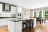 Kitchen view with kitchen dining area