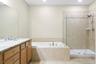 Double Vanity, Jacuzzi tub, Shower and water closet