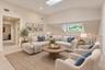 Virtually Staged Loft with skylight and an abundance of natural lighting flowing through the second level.