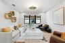 Recessed lighting, wood-finish flooring, and a contemporary ceiling fixture