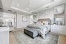 Tray ceiling with recessed lighting and a ceiling fan