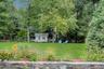 Stone Wall w/gardens
