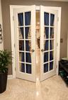 French doors with glass panels and brushed nickel hardware