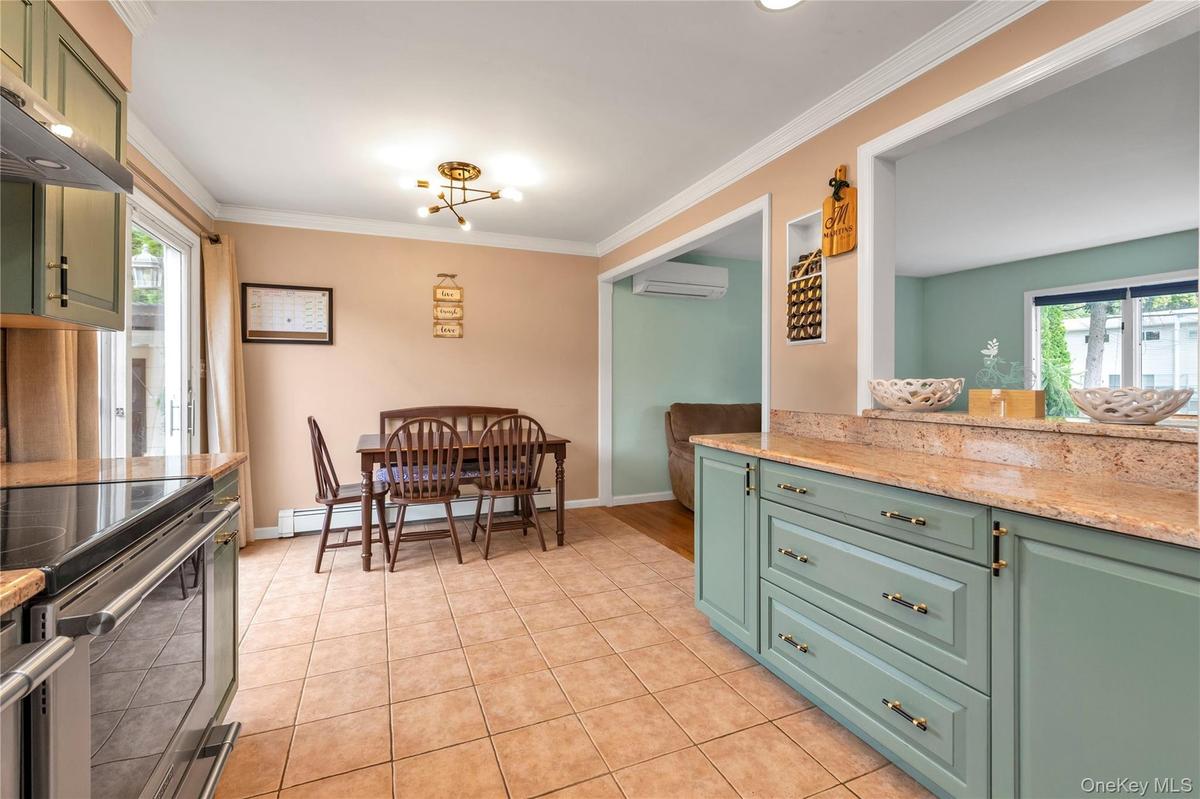 Open Kitchen with Granite Tops.