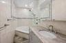 Renovated hall bath with soaking tub.