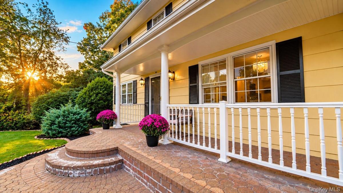 A welcoming walkway leads to your new home and its inviting front porch—the perfect spot to sit back, relax, and enjoy the beauty of the outdoors.