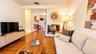Another beautiful view of the spacious family room, showcasing its seamless flow into the inviting eat-in kitchen—an ideal layout for everyday living 
