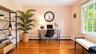 The spacious fourth bedroom offers exceptional versatility and is currently showcased as the perfect home office, providing plenty of room to work, cr