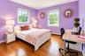 Secondary bedroom with abundance of natural lighting.