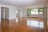 Huge living room opens to dining room and entry way to apartment