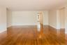 Living Room with hallway to bedroom area.