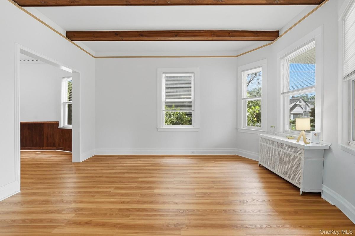 Spacious Livng Room with beamed ceiling