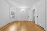 Bedroom with solid wood doors and beautiful wood floors