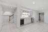 Lower Level with wine refrigerator and workspace