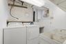 Full-size washer and dryer and slop sink