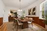Virtually Staged Dining Room with ample room for an 8-person table