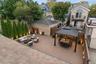 Virtually staged and enhanced backyard.