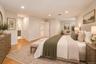 Digitally Staged Primary Suite with Sitting Area and large WIC