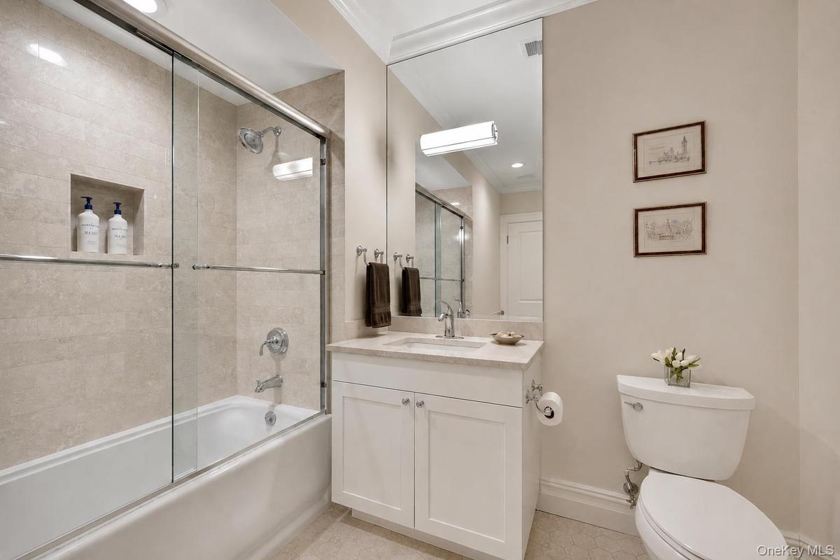 First floor full bathroom off of guest room/in law suite